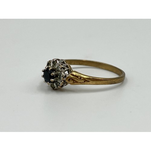 1038 - A 9ct gold sapphire and diamond halo ring, size N½ - approx. gross weight 1.5 grams