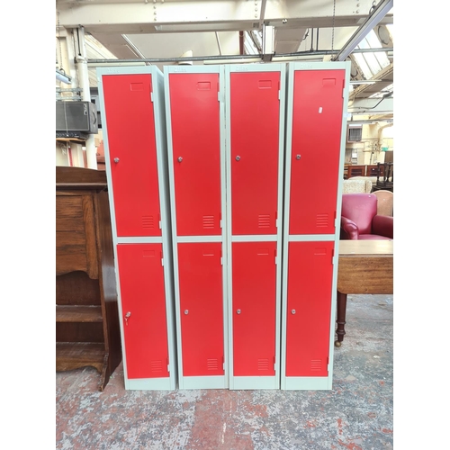 257 - Four Atlas red and grey metal twin door lockers  - approx. 180cm high x 30cm wide x 30cm deep