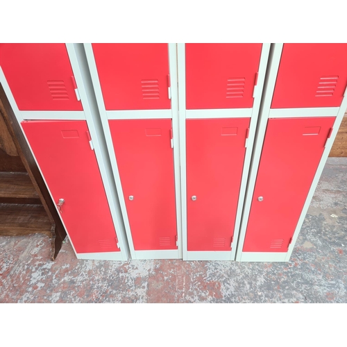 257 - Four Atlas red and grey metal twin door lockers  - approx. 180cm high x 30cm wide x 30cm deep