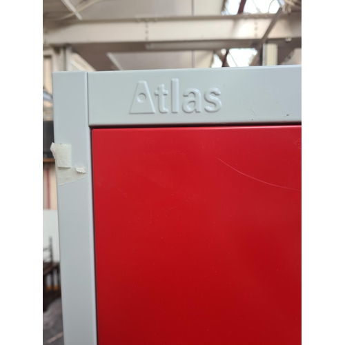 257 - Four Atlas red and grey metal twin door lockers  - approx. 180cm high x 30cm wide x 30cm deep