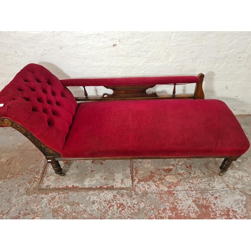 266 - A late Victorian oak and red upholstered chaise longue - approx. 70cm high x 58cm wide x 165cm long