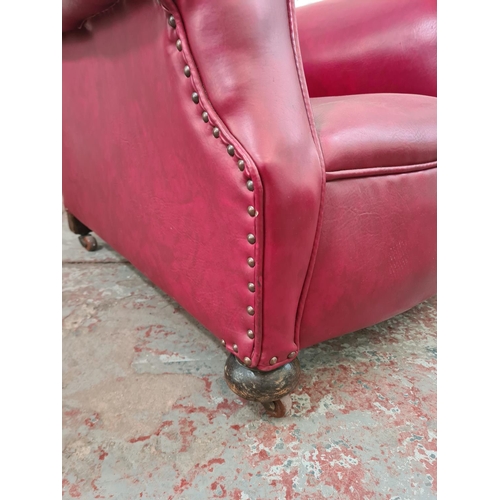 268 - An early 20th century red leatherette armchair - approx. 89cm high x 86cm wide x 88cm deep