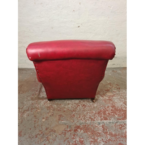 268 - An early 20th century red leatherette armchair - approx. 89cm high x 86cm wide x 88cm deep