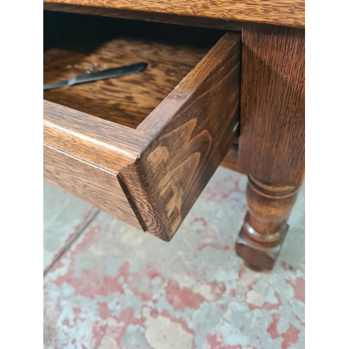 272 - A late 20th century solid oak two drawer rectangular coffee table with lower stretcher - approx. 50c... 