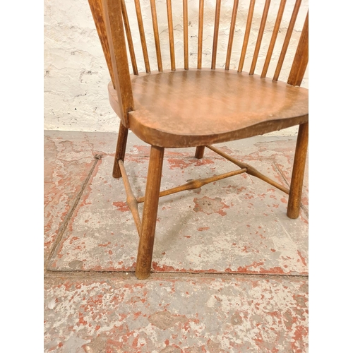 280 - A mid 20th century elm and beech spindle back armchair - approx. 98cm high x 52cm wide x 47cm deep