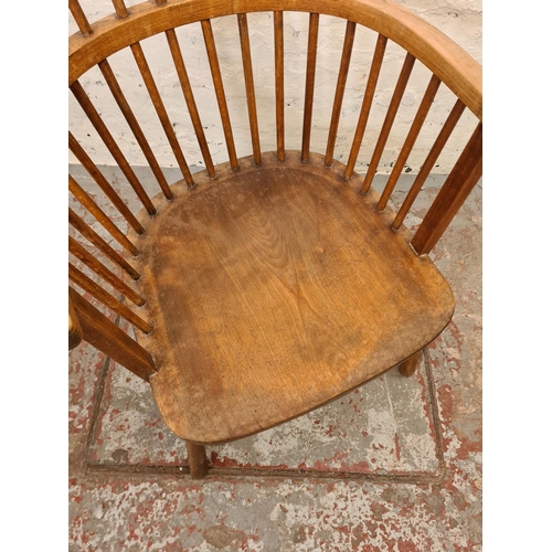 280 - A mid 20th century elm and beech spindle back armchair - approx. 98cm high x 52cm wide x 47cm deep