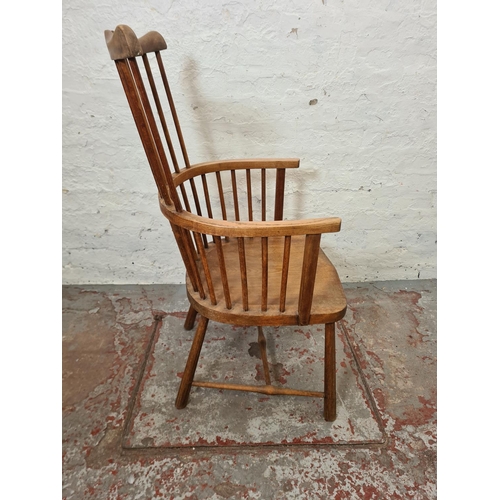 280 - A mid 20th century elm and beech spindle back armchair - approx. 98cm high x 52cm wide x 47cm deep