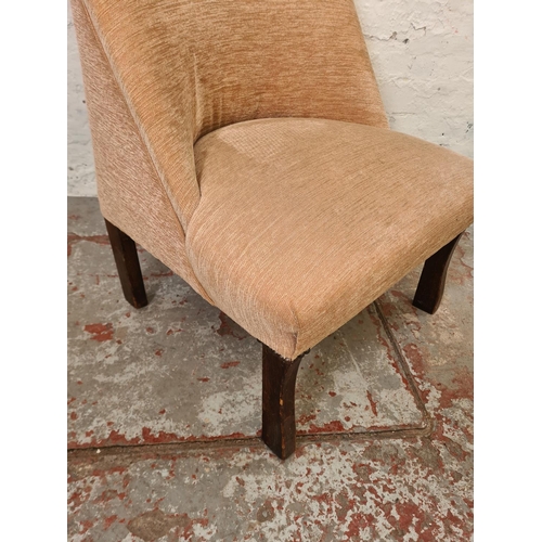 284 - A mid 20th century upholstered bedroom chair with oak supports - approx. 92cm high x 55cm wide x 54c... 