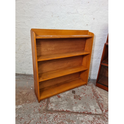 287 - Two mid 20th century bookcases comprising Simplex mahogany three tier sectional bookcase with six gl... 