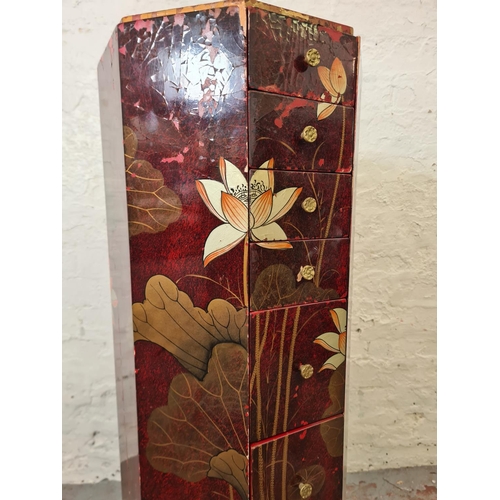 288A - An Oriental red lacquered and hand painted octagonal chest of eight drawers - approx. 103cm high x 3... 