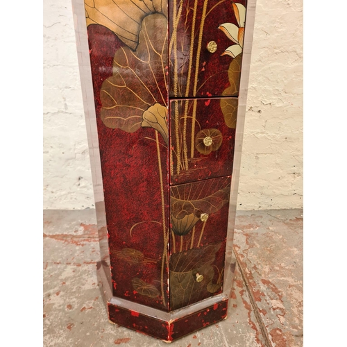 288A - An Oriental red lacquered and hand painted octagonal chest of eight drawers - approx. 103cm high x 3... 