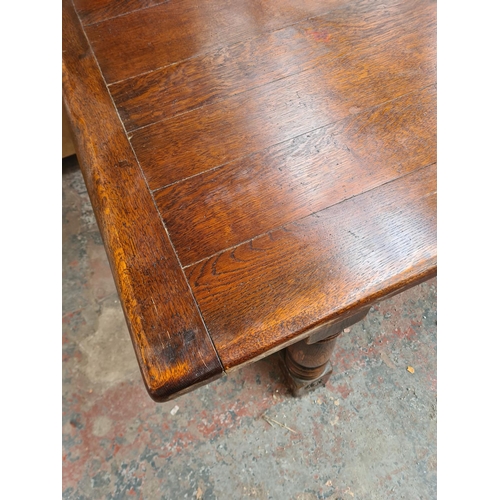 298 - An Arighi Bianchi by The Royal Oak Furniture Company solid oak refectory table with lower stretcher ... 