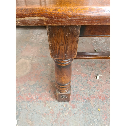 298 - An Arighi Bianchi by The Royal Oak Furniture Company solid oak refectory table with lower stretcher ... 