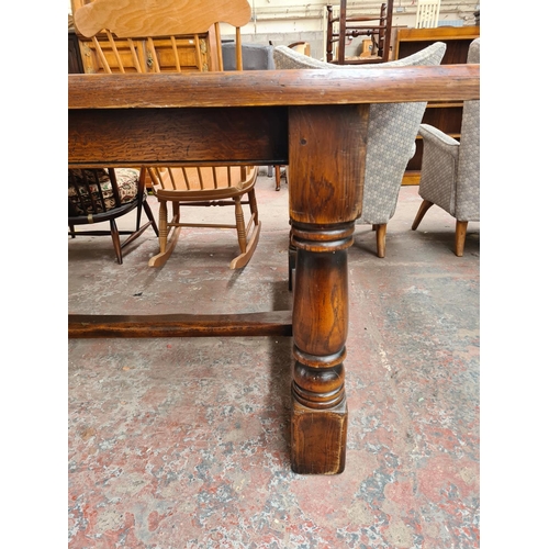 298 - An Arighi Bianchi by The Royal Oak Furniture Company solid oak refectory table with lower stretcher ... 