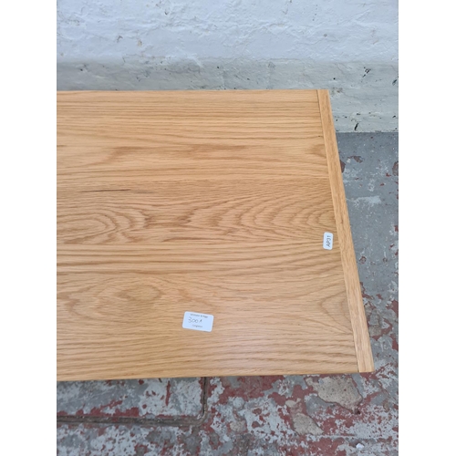 300A - A modern solid oak rectangular Z pedestal coffee table - approx. 45cm high x 45cm wide x 100cm long