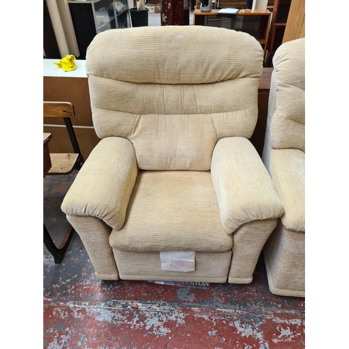 322 - A G Plan beige upholstered three piece lounge suite comprising two seater sofa, electric reclining a... 