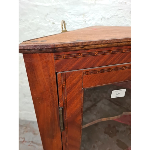 329 - A pair of Edwardian inlaid mahogany wall mountable corner cabinets - approx. 72.5cm high x 53cm wide... 