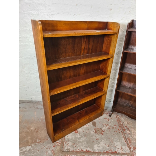 332 - Two mid 20th century oak five tier bookcases, one approx. 119cm high x 77cm wide x 17cm deep and one... 