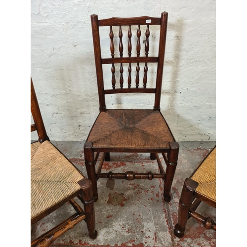 333 - Three 19th century elm and rush seated Lancashire chairs