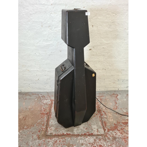 337 - A 19th century ebonised cello case converted illuminating bookcase with Bluetooth speaker and green ... 