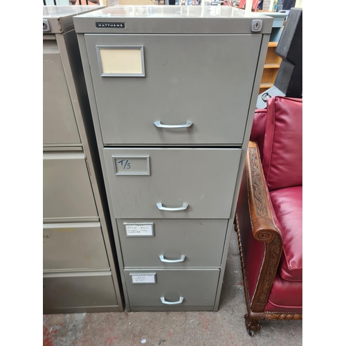 342 - A Matthews grey metal four drawer office filing cabinet - approx. 132cm high x 47cm wide x 62cm deep