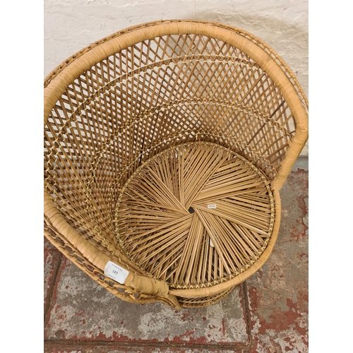 345 - A mid 20th century wicker tub chair - approx. 76cm high x 60cm wide x 47cm deep