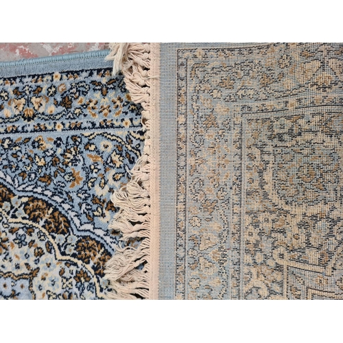 358 - A blue tasselled rug - approx. 175cm x 90cm