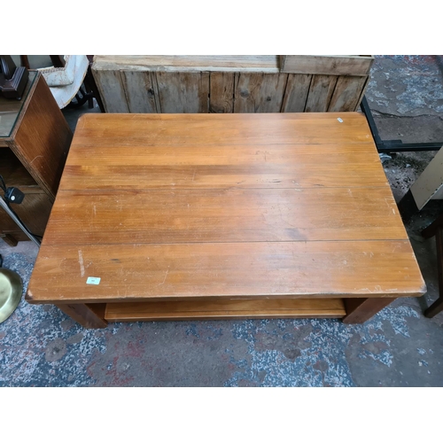 360 - A modern pine rectangular two tier coffee table - approx. 45cm high x 80cm wide x 120cm long