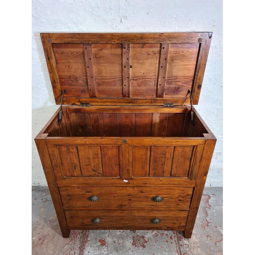 374 - An Irish Coast Collection reclaimed wood blanket box with two lower drawers and shell shaped handles... 