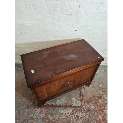 378 - A mid 20th century oak and plywood blanket box - approx. 70cm high x 90cm wide x 45cm deep