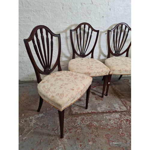 383 - Four 19th century Hepplewhite style mahogany dining chairs