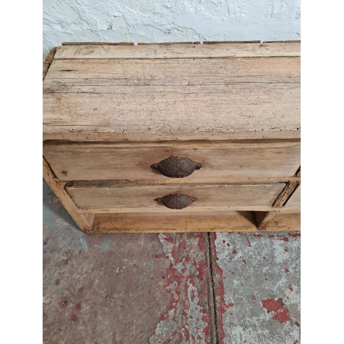 384 - A 19th century pine chest of nine drawers - approx. 39cm high x 140cm wide x 24cm deep