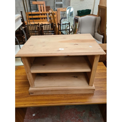 385 - Two pieces of furniture, pine TV stand - approx. 50cm high x 70cm wide x 44cm deep and teak effect o... 