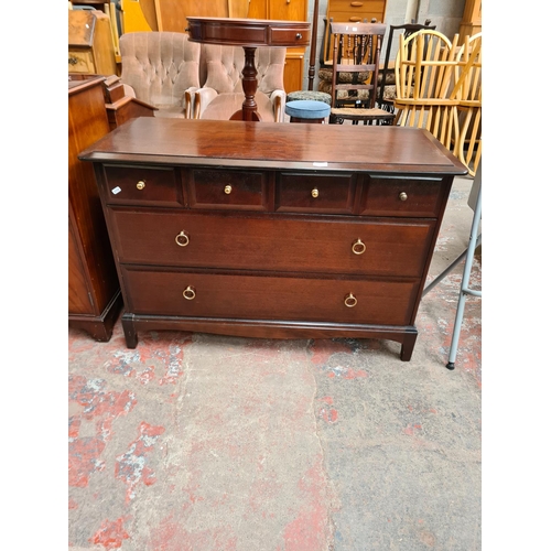 392 - A Stag Minstrel mahogany chest of four short over two long drawers - approx. 71cm high x 107cm wide ... 