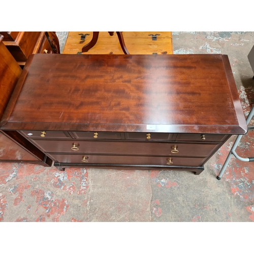 392 - A Stag Minstrel mahogany chest of four short over two long drawers - approx. 71cm high x 107cm wide ... 