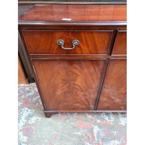 394 - A mahogany sideboard with three drawers and three lower cupboard doors - approx. 85cm high x 137cm w... 