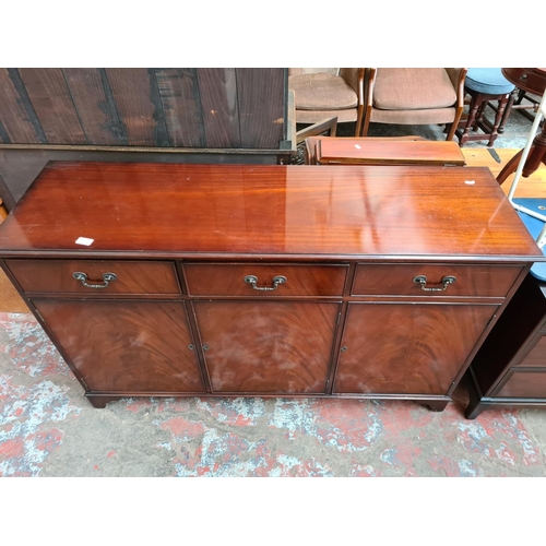 394 - A mahogany sideboard with three drawers and three lower cupboard doors - approx. 85cm high x 137cm w... 