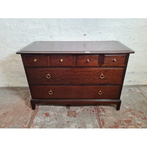 396 - A Stag Minstrel mahogany chest of four short over two long drawers - approx. 71.5cm high x 107cm wid... 