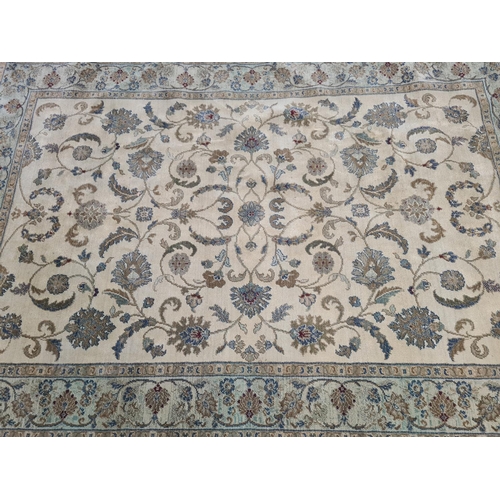 398 - A floral patterned rug - approx. 230cm x 160cm