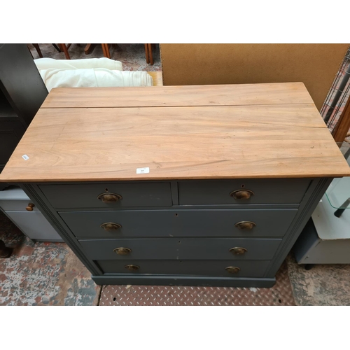 407 - A modern grey painted pine chest of two short over three long drawers with half moon shaped handles ... 