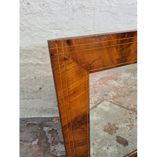 413A - An Edwardian inlaid mahogany wall mirror - approx. 100cm x 68cm