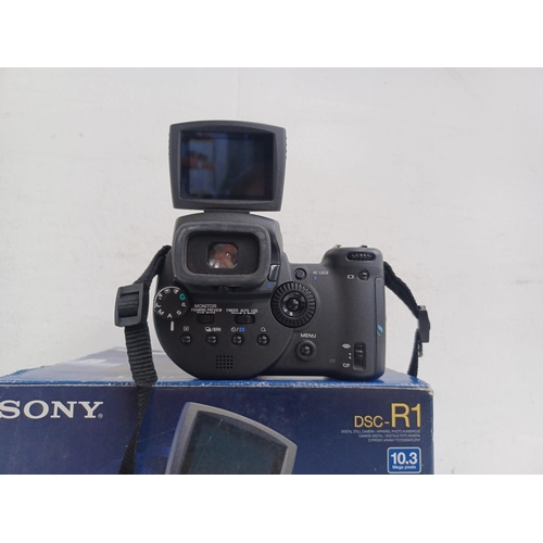 532 - A boxed Sony Cyber-shot DSC-R1 10.3mp digital camera fitted with Zeiss 2.8-4.8/14.3-71.5 T* Vario-So... 