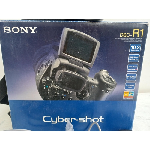 532 - A boxed Sony Cyber-shot DSC-R1 10.3mp digital camera fitted with Zeiss 2.8-4.8/14.3-71.5 T* Vario-So... 