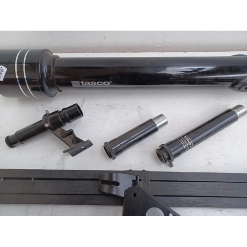 539 - A Tasco D=60mm F=700mm telescope with accessories and tripod parts