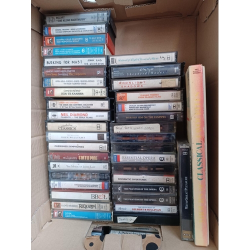 546 - Three boxes containing compact cassettes and CDs - see images for titles