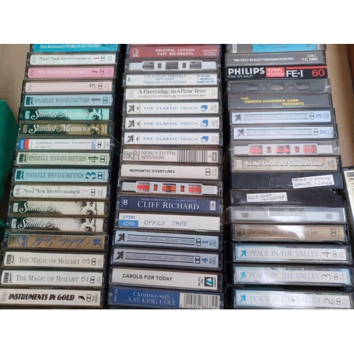 546 - Three boxes containing compact cassettes and CDs - see images for titles