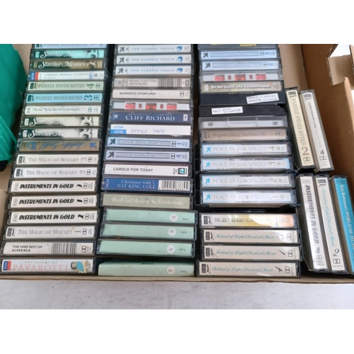 546 - Three boxes containing compact cassettes and CDs - see images for titles