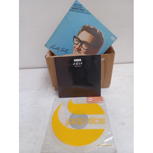 549 - A box containing a collection of vinyl records to include Klubbheads picture disc, Buddy Holly six r... 