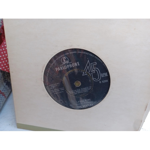 554 - A box and three bags containing vinyl records to include The Ronettes, Queen, The Beatles, Thin Lizz... 