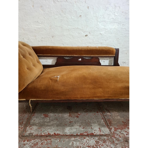 302 - A late Victorian mahogany and gold upholstered chaise longue - approx. 69cm high x 64cm wide x 172cm... 